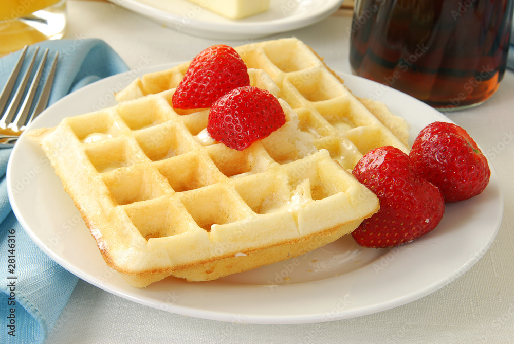 Buttered waffle with strawberries Buttered waffle with strawberries