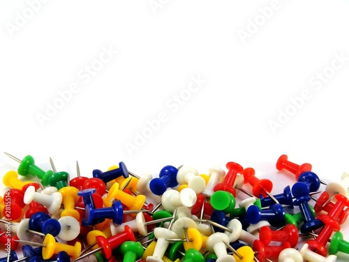 Coloured thumbtacks with copy space