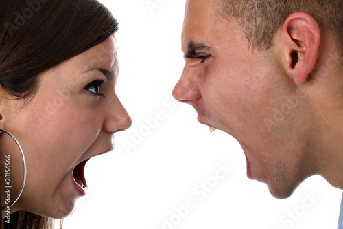 Young couple yelling at each other isolated on white