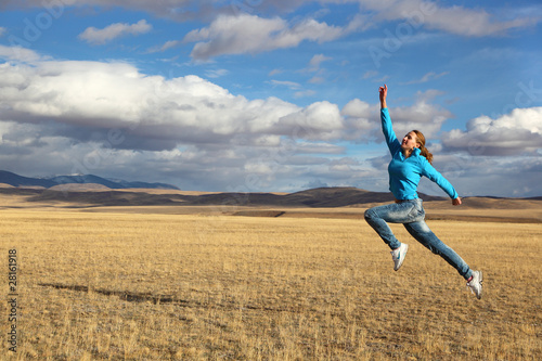 jumping smiling girl