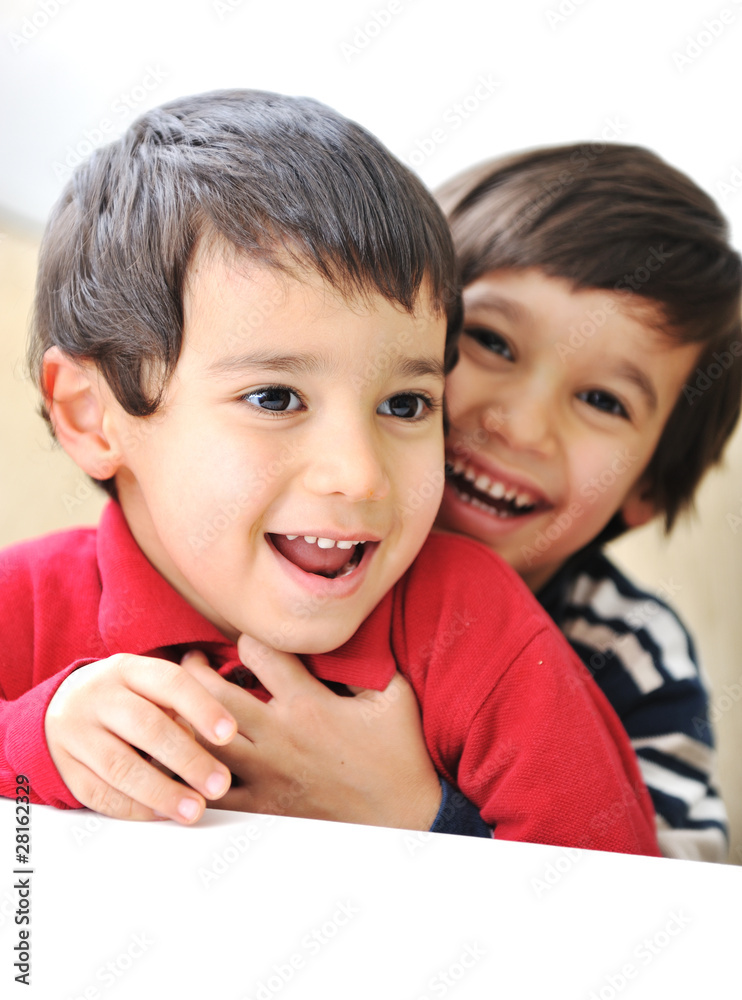 Two happy brothers, happiness, playing, laugh, fun, childhood Two happy brothers, happiness, playing, laugh, fun, childhood