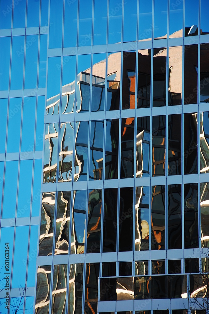 Building reflected in windows