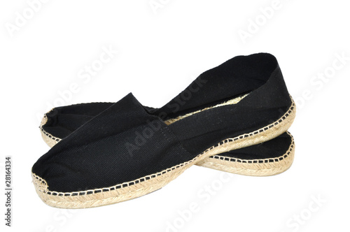 A pair of espadrilles isolated on a white background