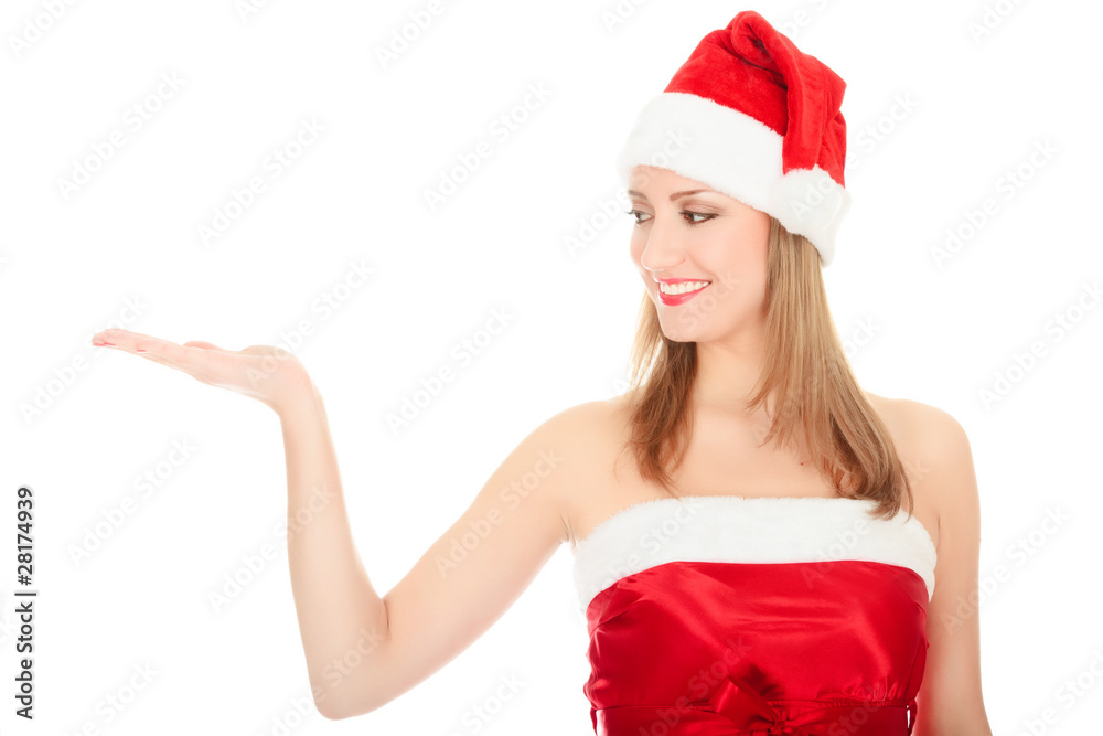 Pretty Christmas girl holding her hand palm up Pretty Christmas girl holding her hand palm up
