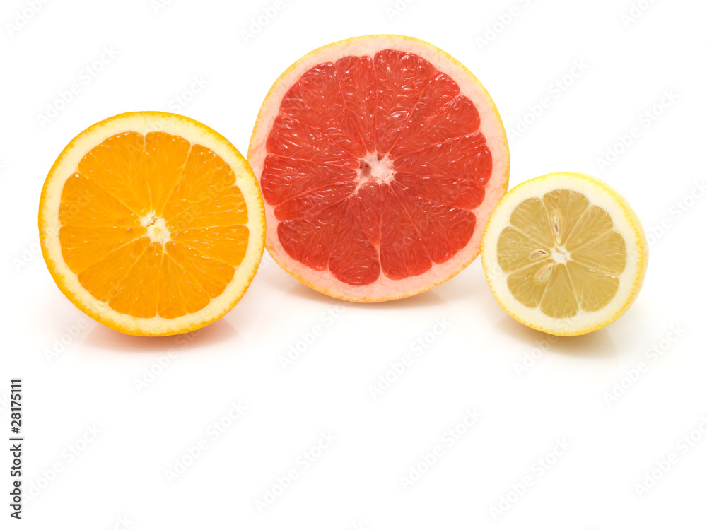 half of orange, lemon and grapefruit on white background half of orange, lemon and grapefruit on white background