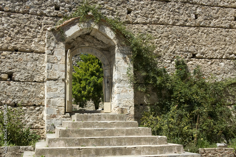 Metropolis of Mystras - Entrance to beautiful garden Metropolis of Mystras - Entrance to beautiful garden