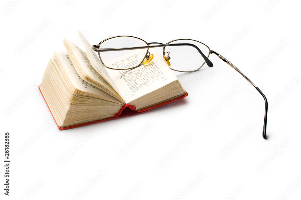 Book and glasses isolated on white Book and glasses isolated on white