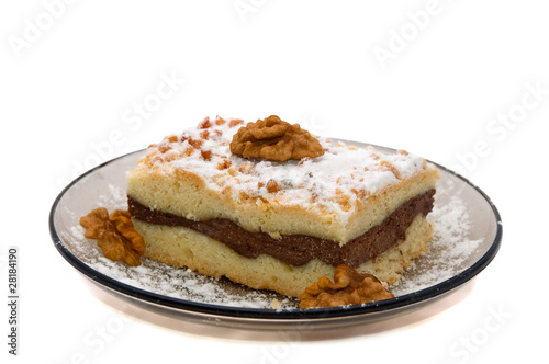 a piece of cottage cheese cake with walnut