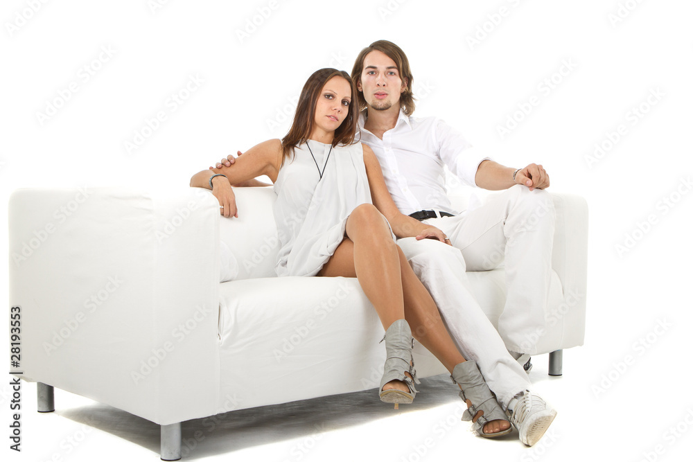 Young fresh european couple on sofa Young fresh european couple on sofa