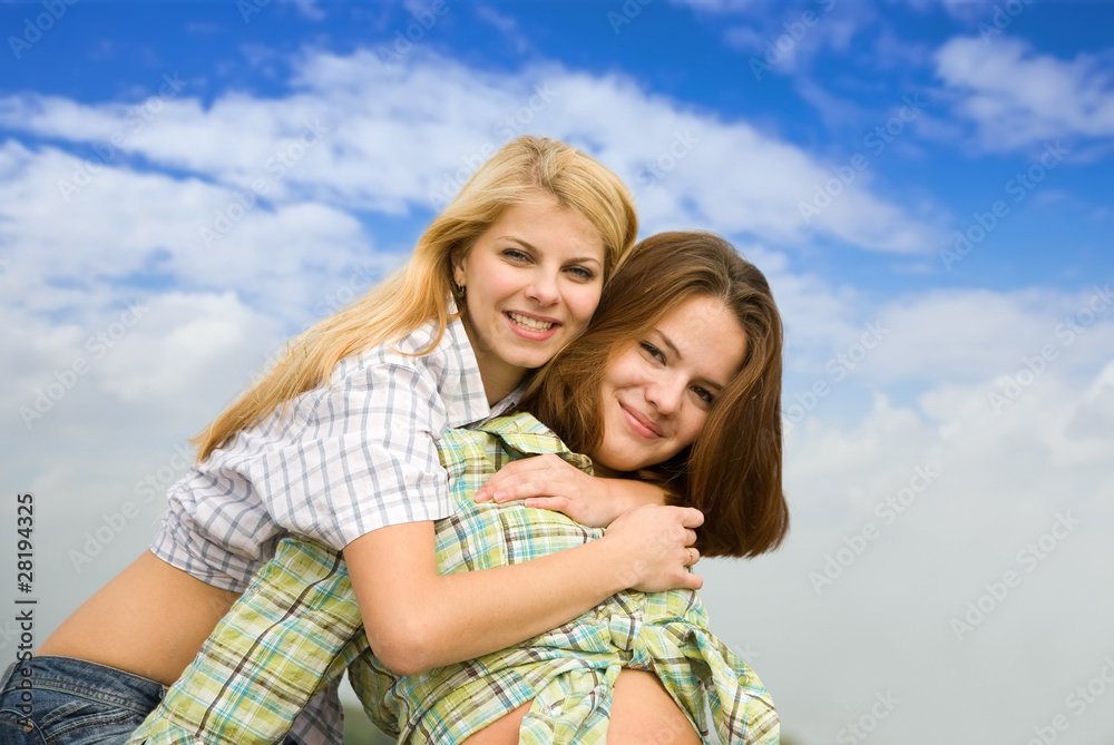 Fototapeta premium girl embracing girlfriend