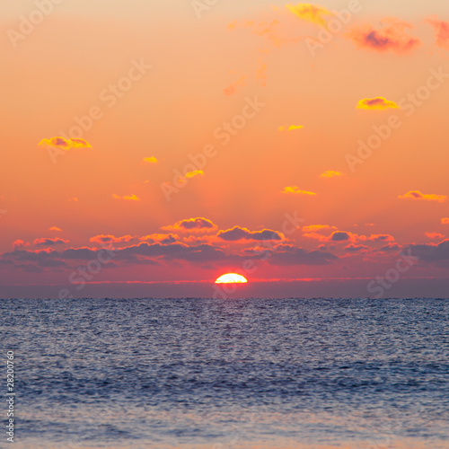 Red sunrise on the sea