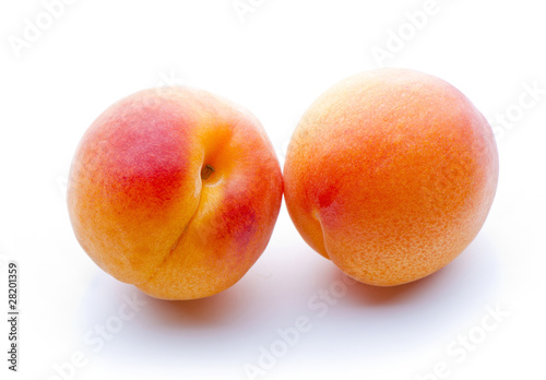 two apricots close-up