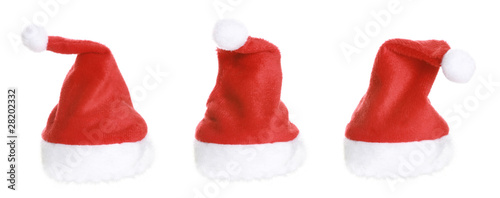 Three Santa Hat isolated on white background