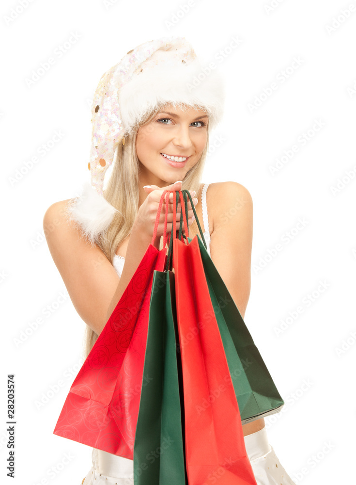 cheerful santa helper with shopping bags cheerful santa helper with shopping bags