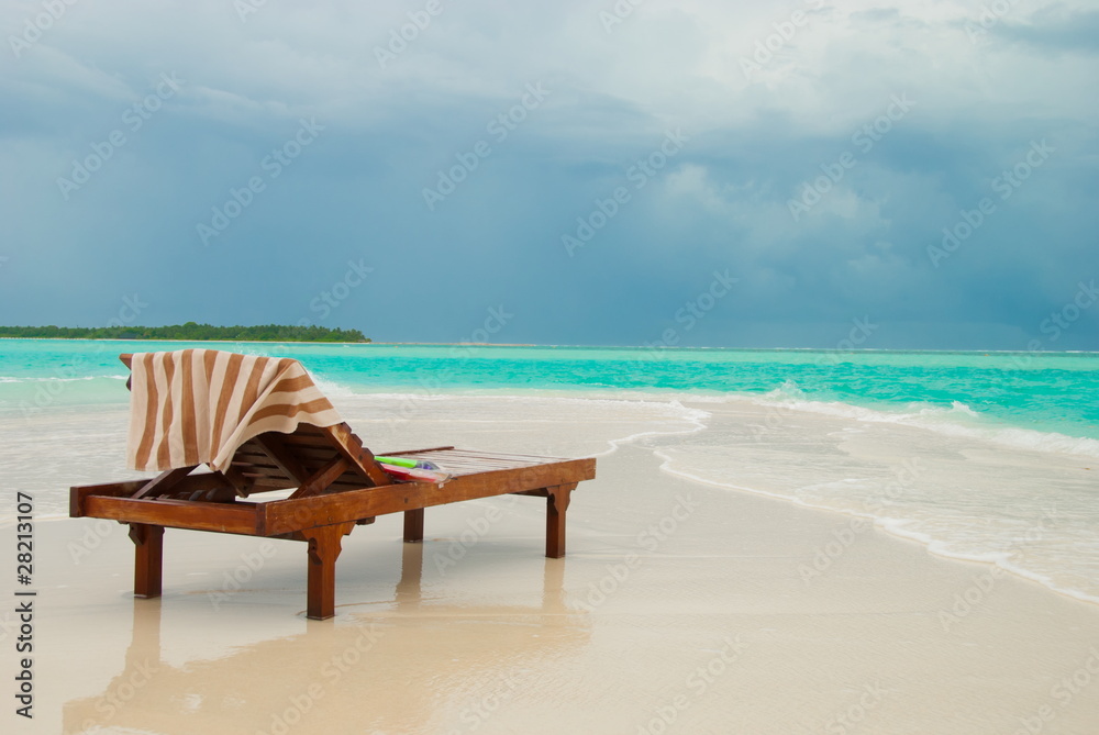 Sun lounger on tropical beach