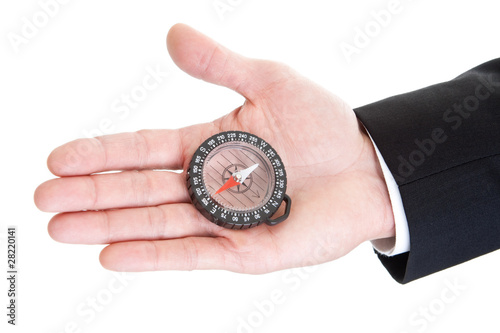 Man's Hand Holding Clear Compass Isolated on White Background