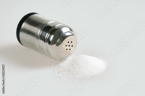 Salt shaker and spilled salt