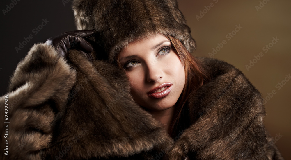 beautiful woman in a fur coat