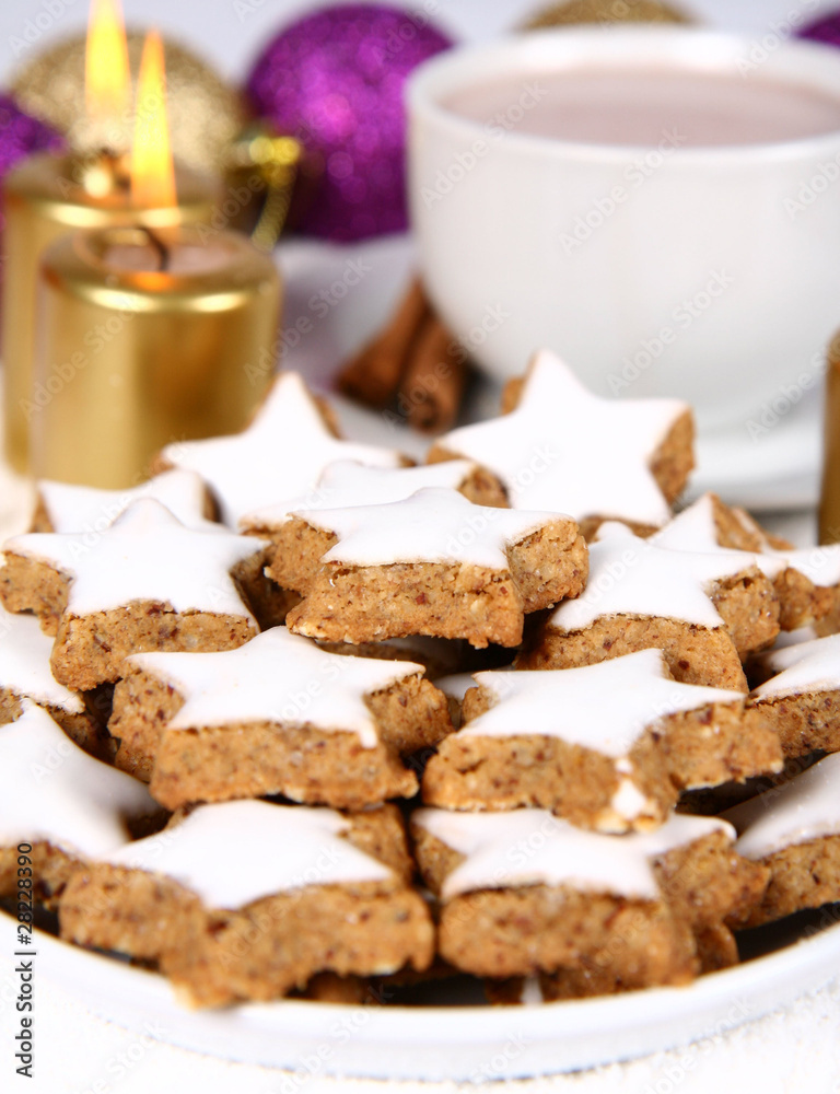 Cinnamon, christmas cookies with a cup of hot cocoa Cinnamon, christmas cookies with a cup of hot cocoa