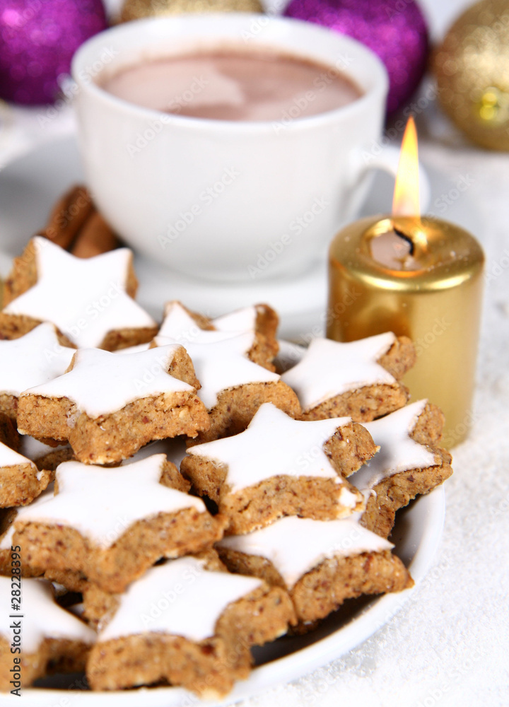 Christmas star shaped cookies and a cup of hot cocoa