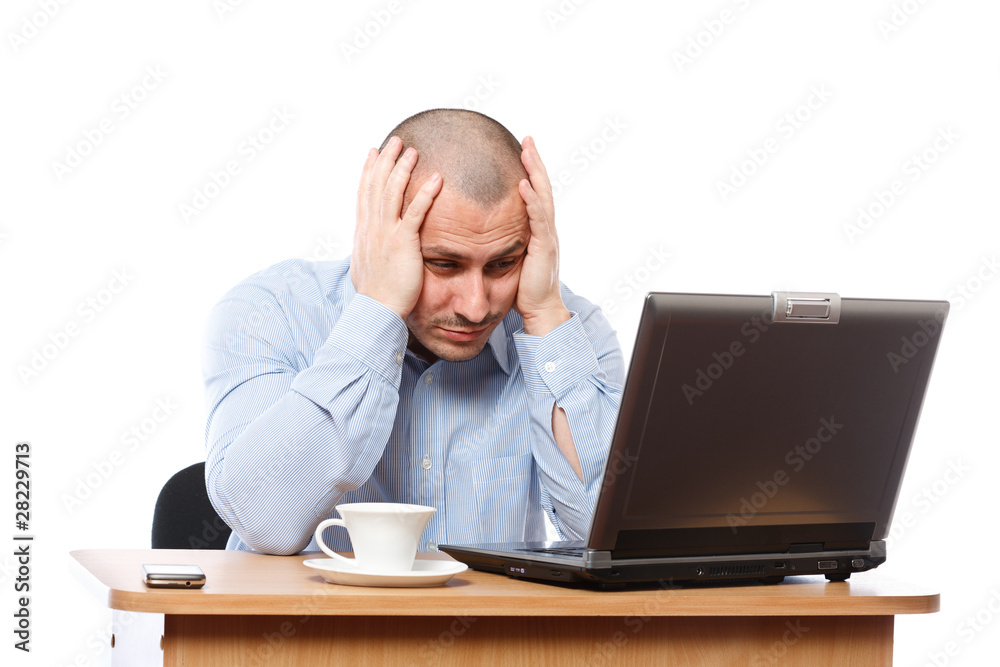 Stressed businessman at computer Stressed businessman at computer