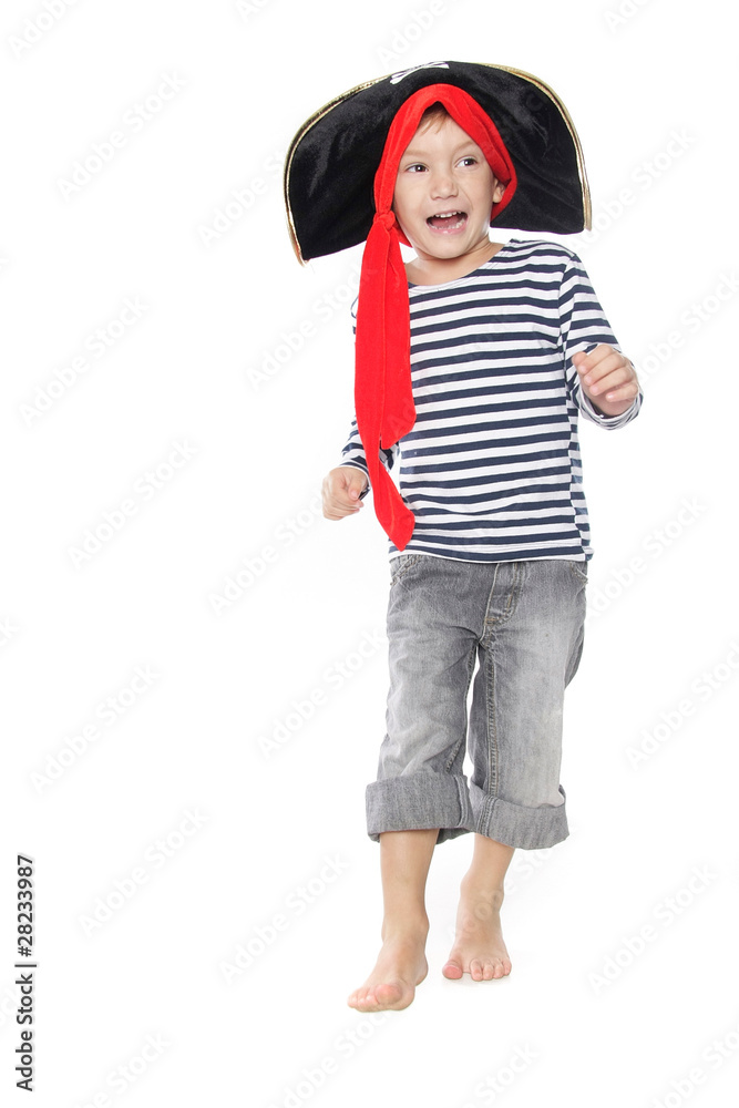 young boy dressed as pirate running over white young boy dressed as pirate running over white