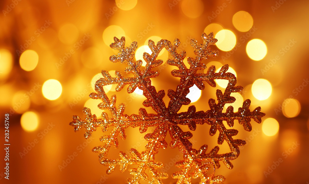 Golden snowflake Christmas tree decoration