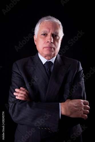 Portrait of a handsome mature businessman, thinking