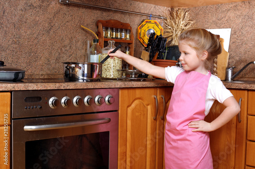 Girl cooking in the Kitchen
