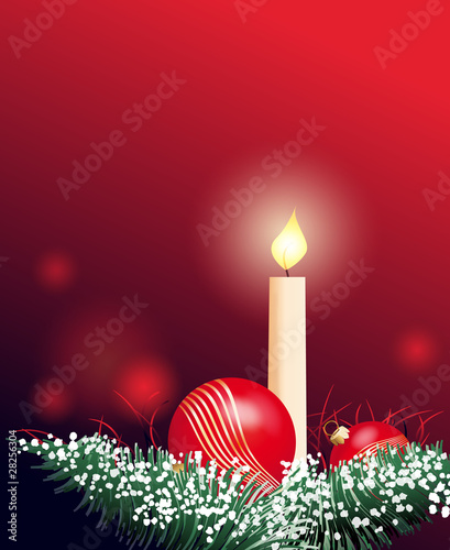 Christmas decoration with a candle and a red bauble