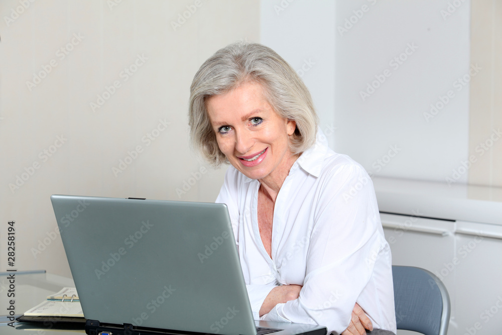 Senior businesswoman in the office Senior businesswoman in the office