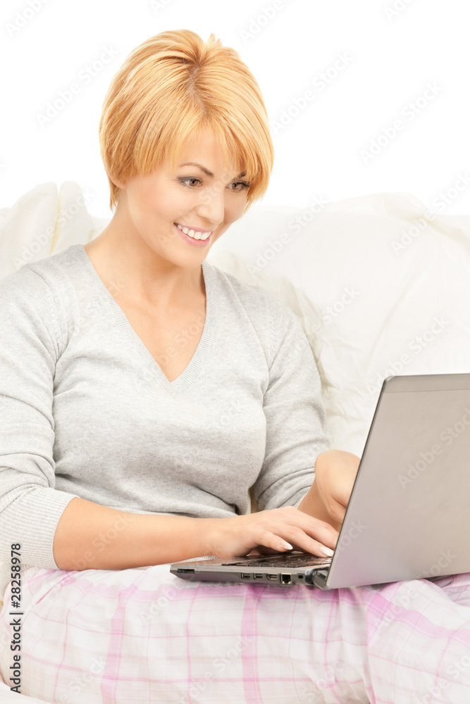 happy woman with laptop computer