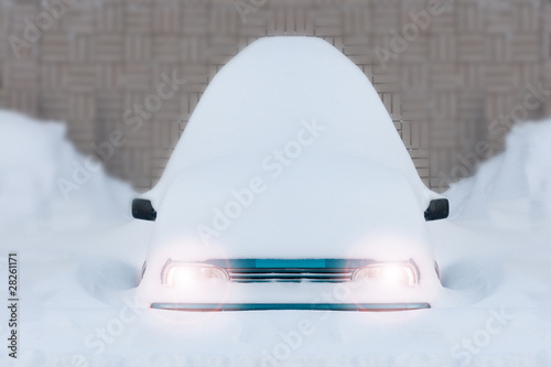 Car buried under snow