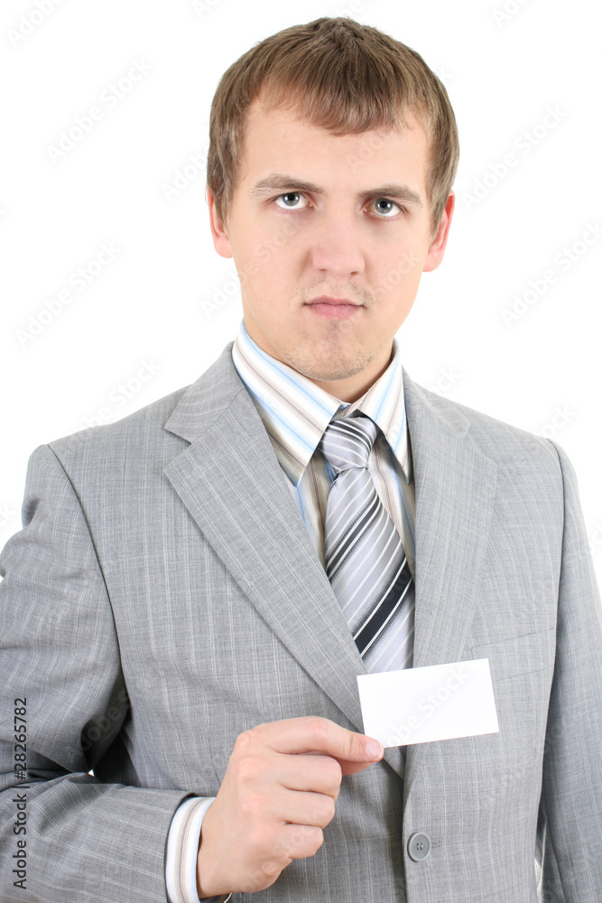 Young businessman showing a blank business card