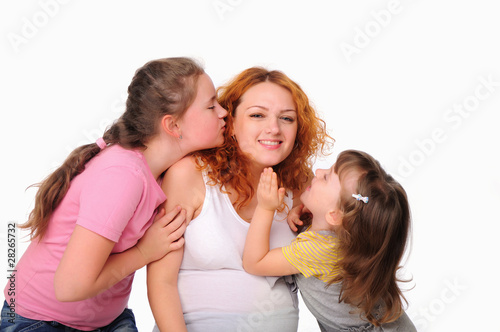 young pregnant mother and her two daughters