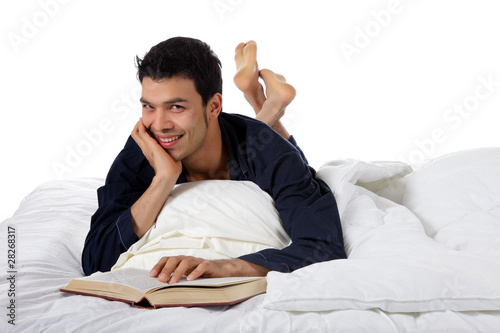 Young attractive nepalese man in pyjamas
