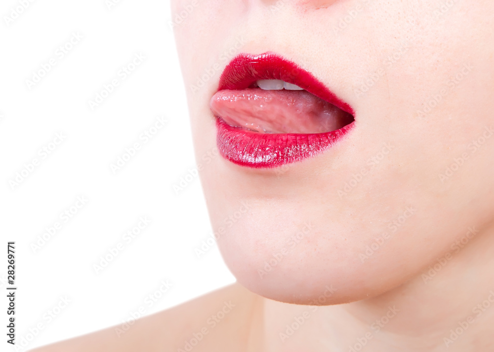Obraz premium Woman with lips with red lipstick