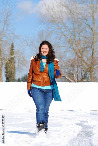 Girl Walking in the Snow