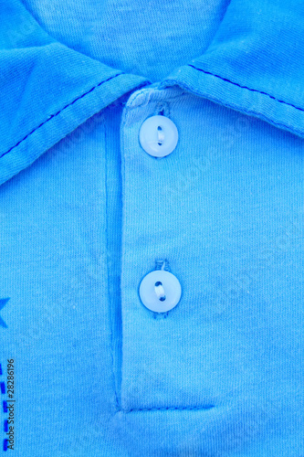 A part of a shirt with buttons