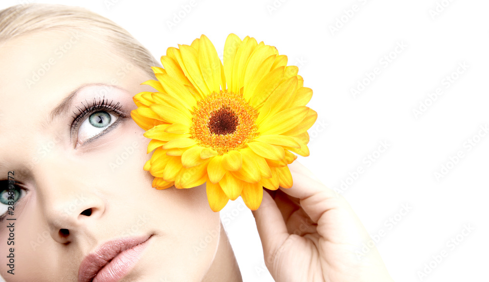 Beautiful young woman with gerber flower isolated on Beautiful young woman with gerber flower isolated on