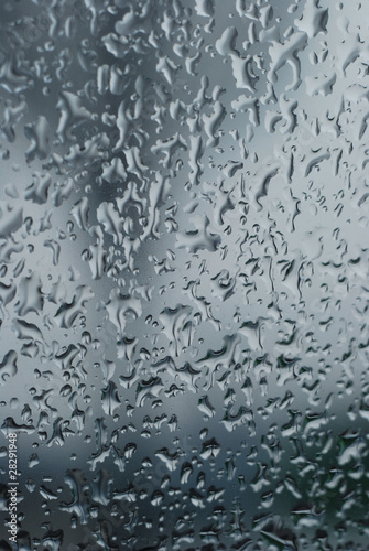 Water droplets on a window / background