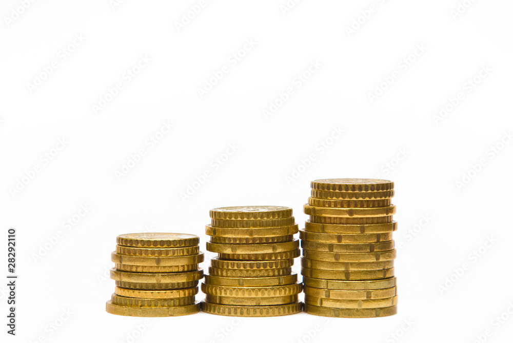 Piles of euro coins isolated on white Piles of euro coins isolated on white