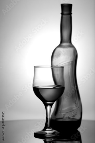 wineglass and bottle on the desk. kitchen still-life