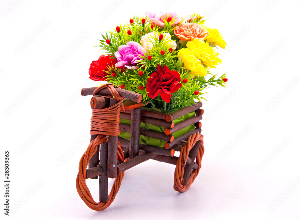 beautiful and colorful flower bouquet in wooden basket in car sh