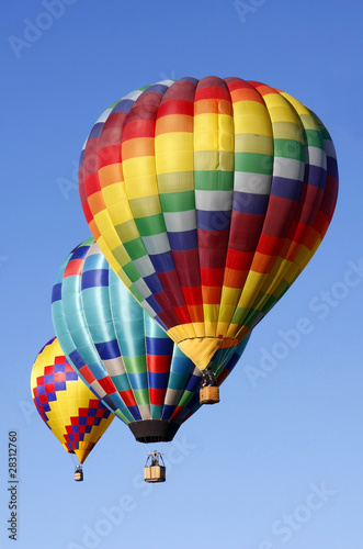 Colorful Hot Air Balloons Against Blue Sky