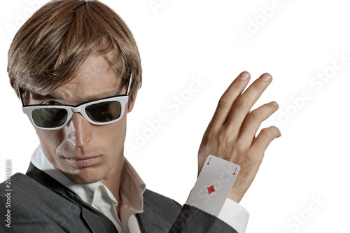 Canvas Print Business man hiding an ace card under sleeve