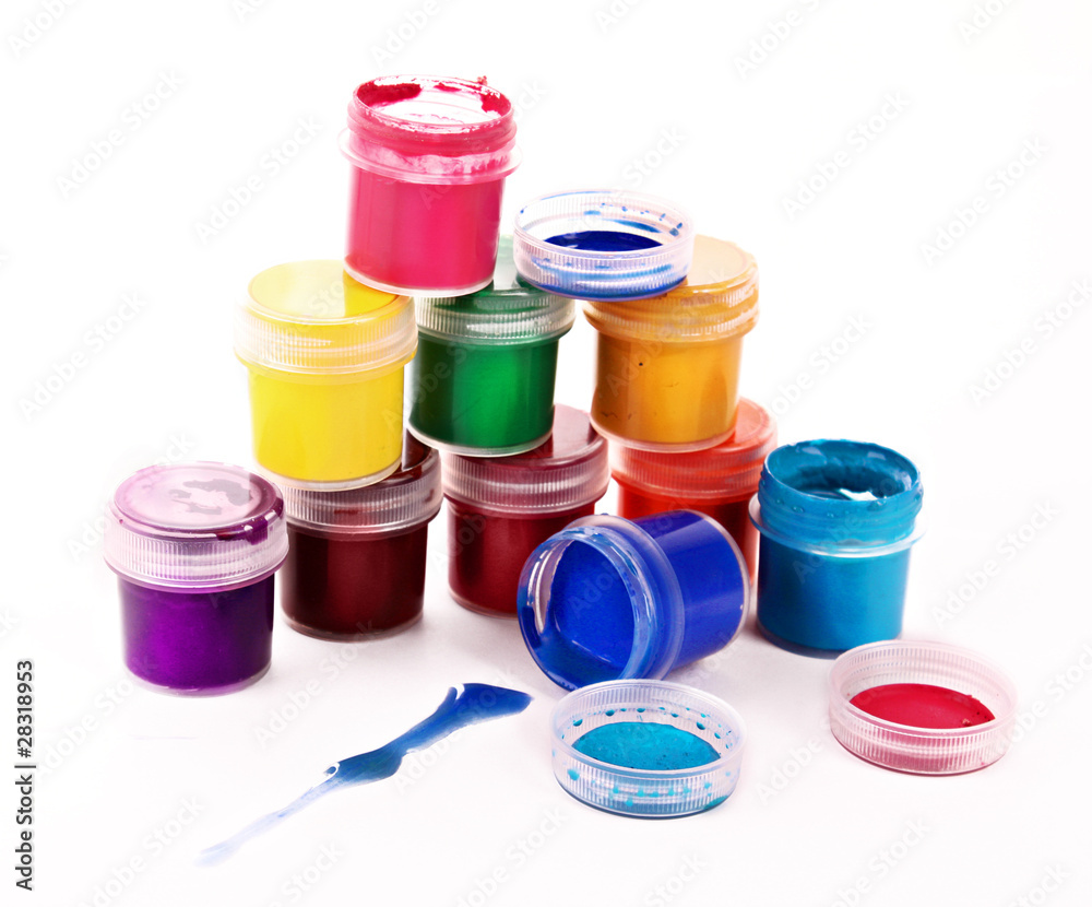 Colorful vibrant cans of gouache isolated on white Colorful vibrant cans of gouache isolated on white