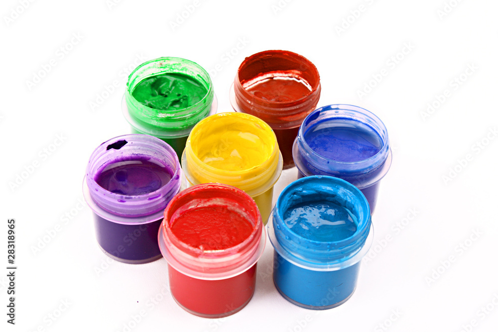 Colorful vibrant cans of gouache isolated on white Colorful vibrant cans of gouache isolated on white