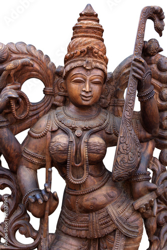 wooden statue of Hindu goddess Saraswathi