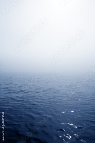 Canvas Print Blue fog sea in a foggy day with low ocean visibility